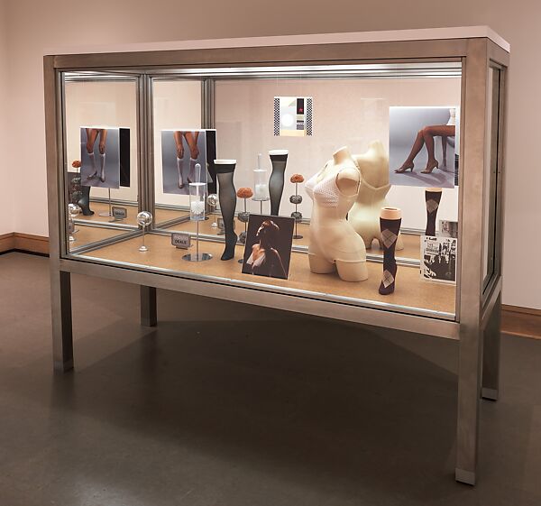 Blow Up (Michelli), Josephine Meckseper (German, born Lilienthal, 1964), Body form (torso with undergarment), two plastic frames with two photos in each, leg form (calf high with sock), leg form (thigh high with stocking), round metal stand, toilet scrubber in holder, metal sculpture, 2 glass balls, double sided ENDLESS DEALS sign, clipstand, double sided color prints mounted on Sintra, double-sided C-print/silver gelatin print mounted on Sintra and unmounted silver gelatin print