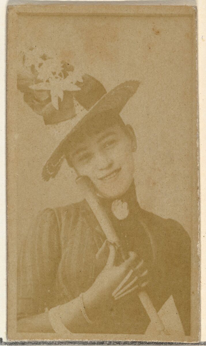 [Actress holding cane or staff to cheek], from the Actors and Actresses series (N145-8) issued by Duke Sons & Co. to promote Duke Cigarettes, Issued by W. Duke, Sons &amp; Co. (New York and Durham, N.C.), Albumen photograph 