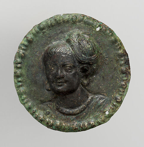 One of a pair of medallions with portrait busts