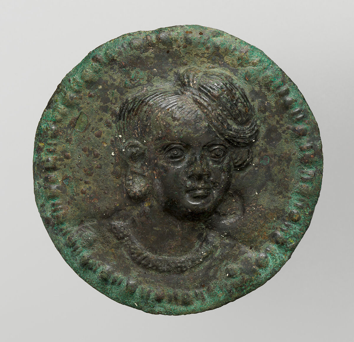 One of a pair of medallions with portrait busts, Copper-nickel alloy, India, probably Maharashtra 