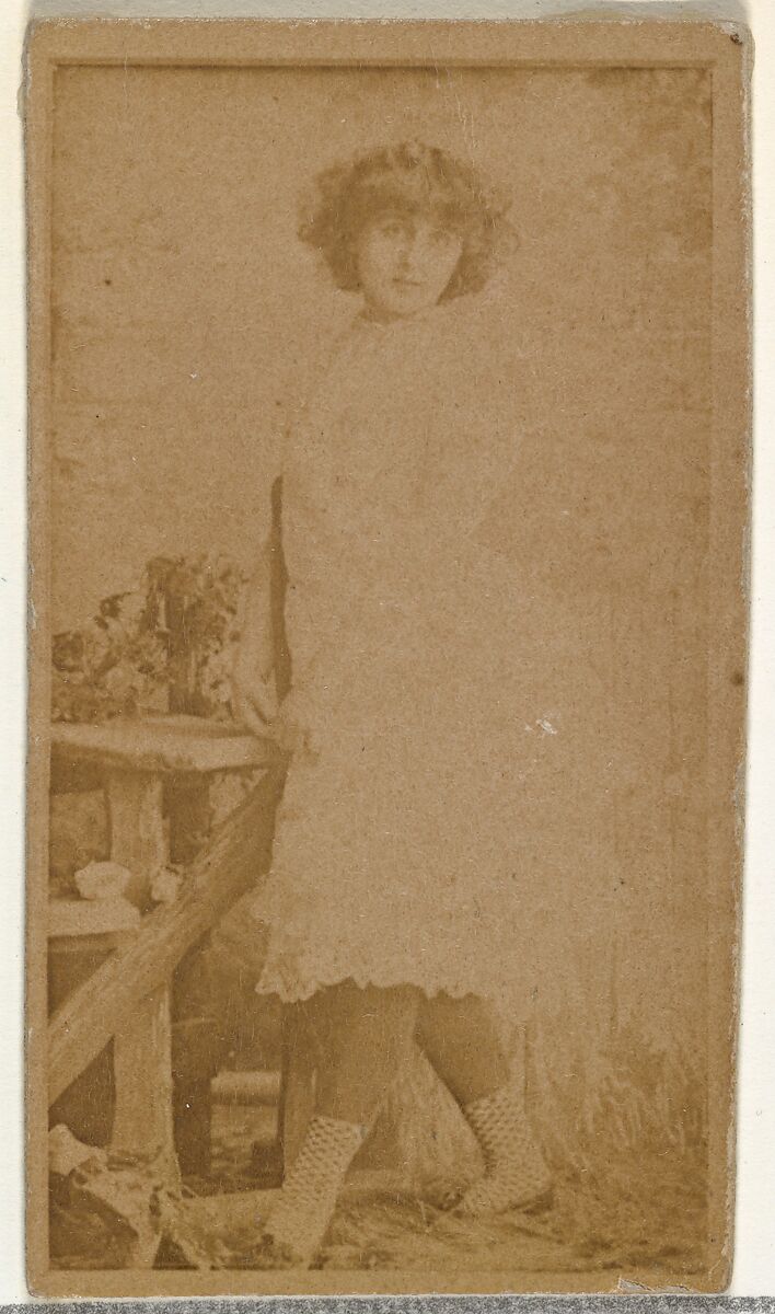 [Actress posing by prop wooden fence], from the Actors and Actresses series (N145-8) issued by Duke Sons & Co. to promote Duke Cigarettes, Issued by W. Duke, Sons &amp; Co. (New York and Durham, N.C.), Albumen photograph 