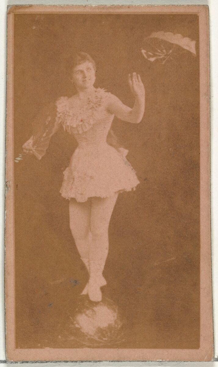[Actress balancing on ball while holding fan], from the Actors and Actresses series (N145-8) issued by Duke Sons & Co. to promote Duke Cigarettes, Issued by W. Duke, Sons &amp; Co. (New York and Durham, N.C.), Albumen photograph 