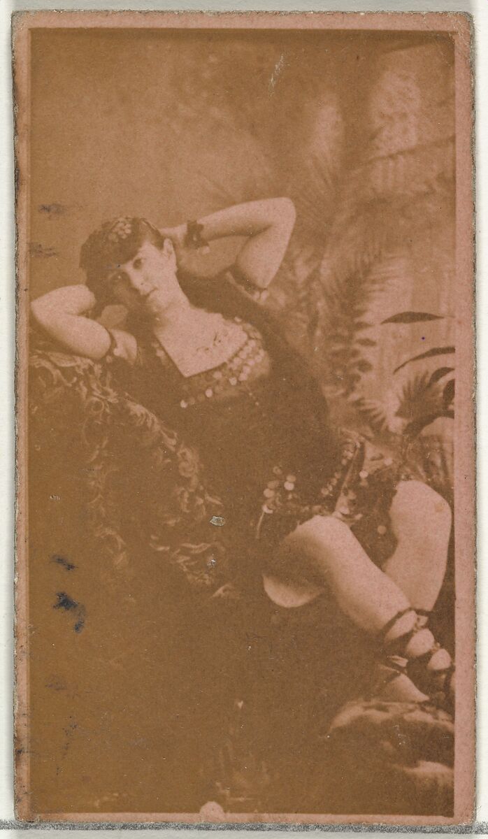 [Reclining actress with hands behind head], from the Actors and Actresses series (N145-8) issued by Duke Sons & Co. to promote Duke Cigarettes, Issued by W. Duke, Sons &amp; Co. (New York and Durham, N.C.), Albumen photograph 