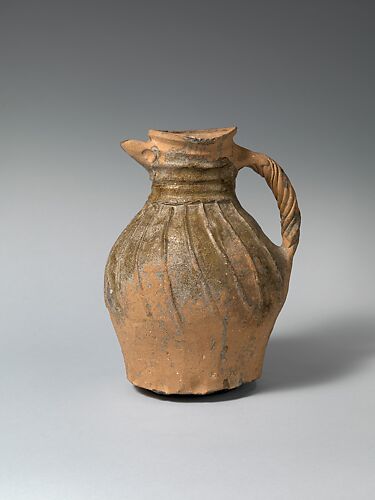 Jug with twisted handle