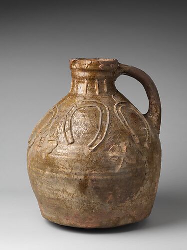 Jug with Horseshoes