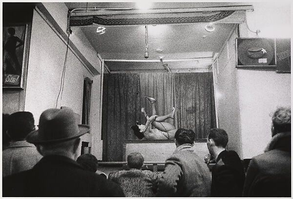 Contortionist Lydia Suarez performing for an audience, Hubert’s Museum, N.Y.C., Diane Arbus (American, New York 1923–1971 New York), Gelatin silver print 