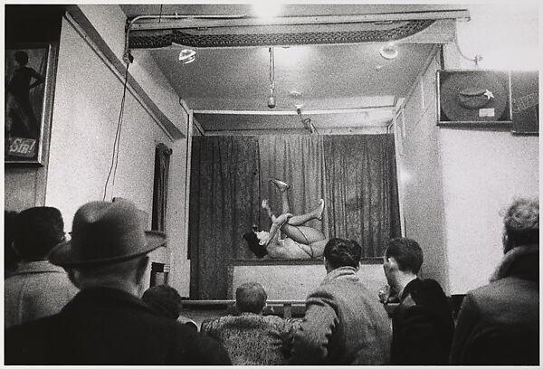 Contortionist Lydia Suarez performing for an audience, Hubert’s Museum, N.Y.C., Diane Arbus  American, Gelatin silver print