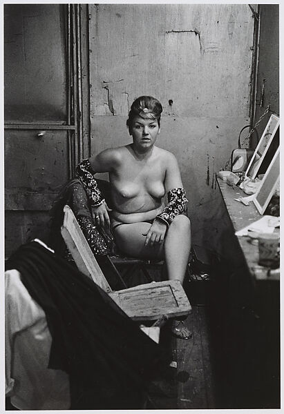 Stripper with bare breasts sitting in her dressing room, Atlantic City, N.J., Diane Arbus  American, Gelatin silver print