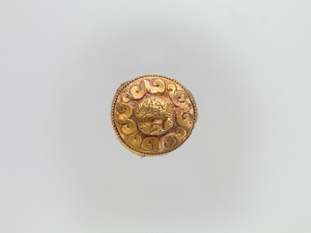 Cap-Shaped Plaque with Lion, Gold, China (Xinjiang Autonomous Region, Central Asia) 