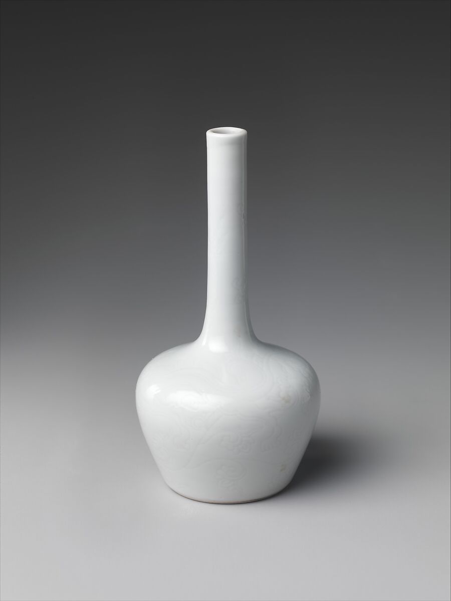 Pair of vases with decoration of dragons among clouds, Porcelain with incised decoration (anhua) under a transparent glaze (Jingdezhen ware), China