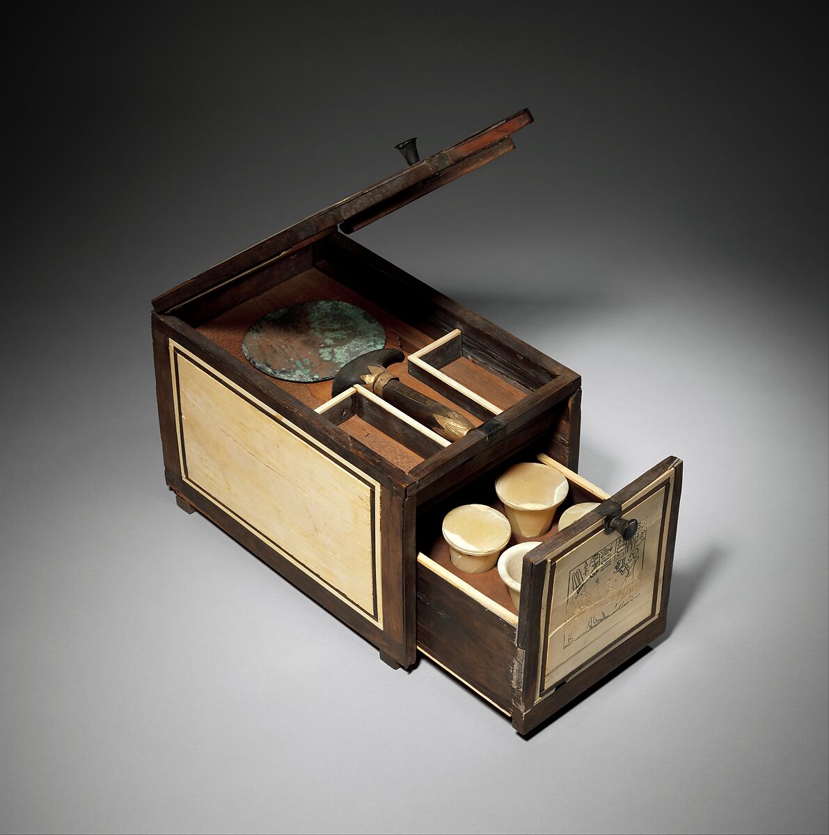 Cosmetic Box of Kemeni and Mirror of Reniseneb, Cedar, with ebony and ivory veneer and silver mounting 