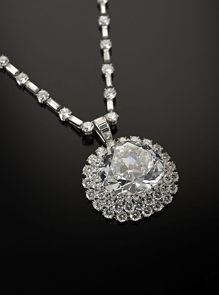"Idol's Eye" Diamond with Harry Winston Necklace, Antique triangular modified brilliant-cut light blue diamond 