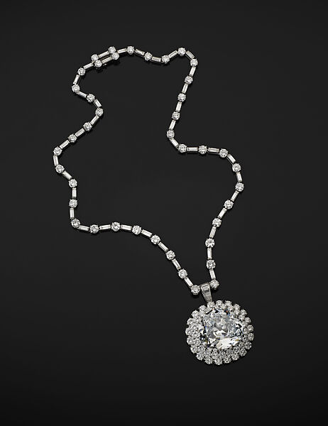 "Idol's Eye" Diamond with Harry Winston Necklace, Antique triangular modified brilliant-cut light blue diamond