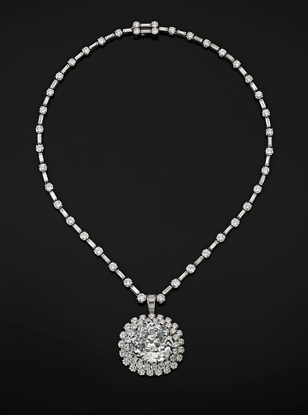 "Idol's Eye" Diamond with Harry Winston Necklace, Antique triangular modified brilliant-cut light blue diamond