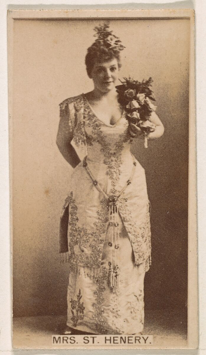 Issued by Kinney Brothers Tobacco Company, Mrs. St. Henery, from the Actresses  series (N245) issued by Kinney Brothers to promote Sweet Caporal Cigarettes