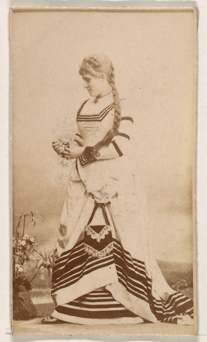 Standing actress in striped gown, from the Actresses series (N245) issued by Kinney Brothers to promote Sweet Caporal Cigarettes, Issued by Kinney Brothers Tobacco Company, Albumen photograph 