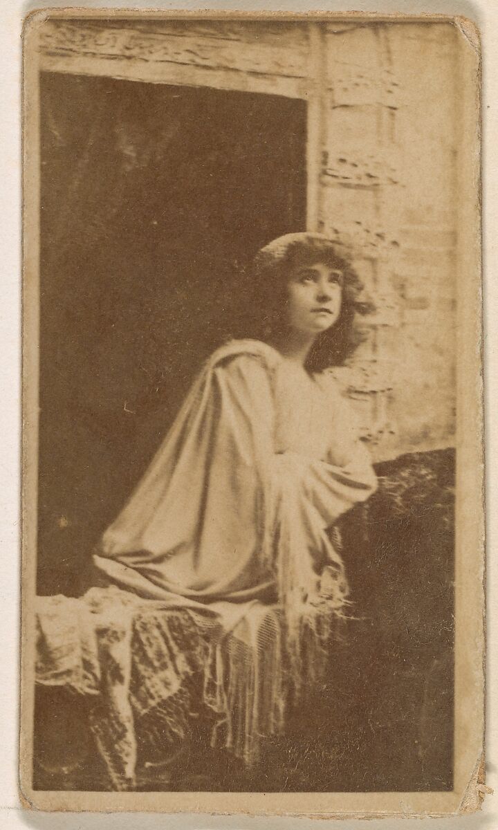 Actress posed in open window, from the Actresses series (N245) issued by Kinney Brothers to promote Sweet Caporal Cigarettes, Issued by Kinney Brothers Tobacco Company, Albumen photograph 