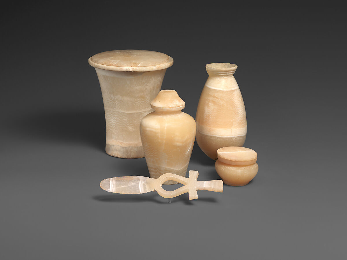 A group of stone vessels from a tomb at Haraga, Travertine (Egyptian alabaster) 