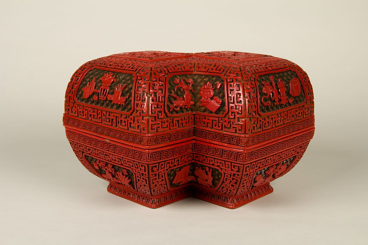 Lozenge box with scene of treasure tributary, Carved red lacquer, China