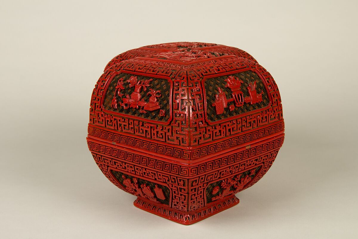 Lozenge box with scene of treasure tributary, Carved red lacquer, China