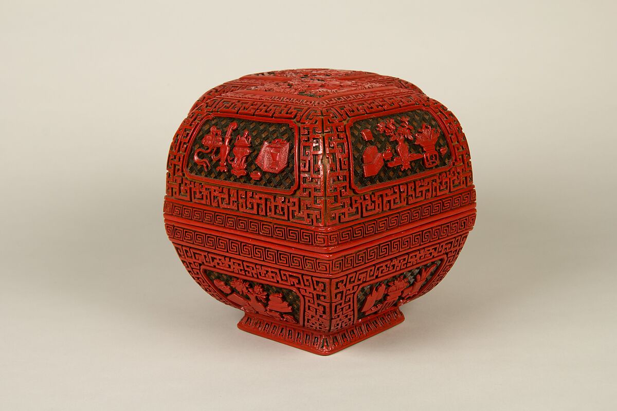 Lozenge box with scene of treasure tributary, Carved red lacquer, China