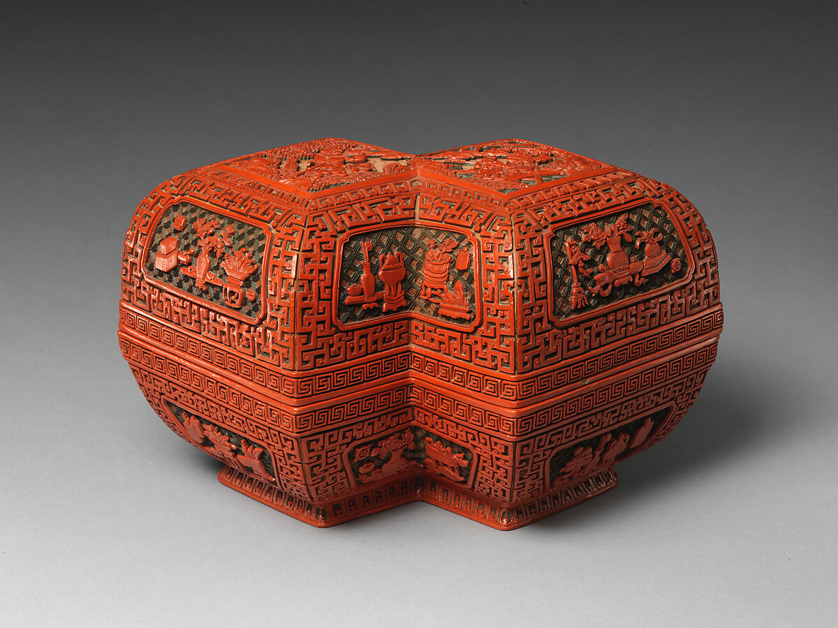 Lozenge box with scene of treasure tributary, Carved red lacquer, China 