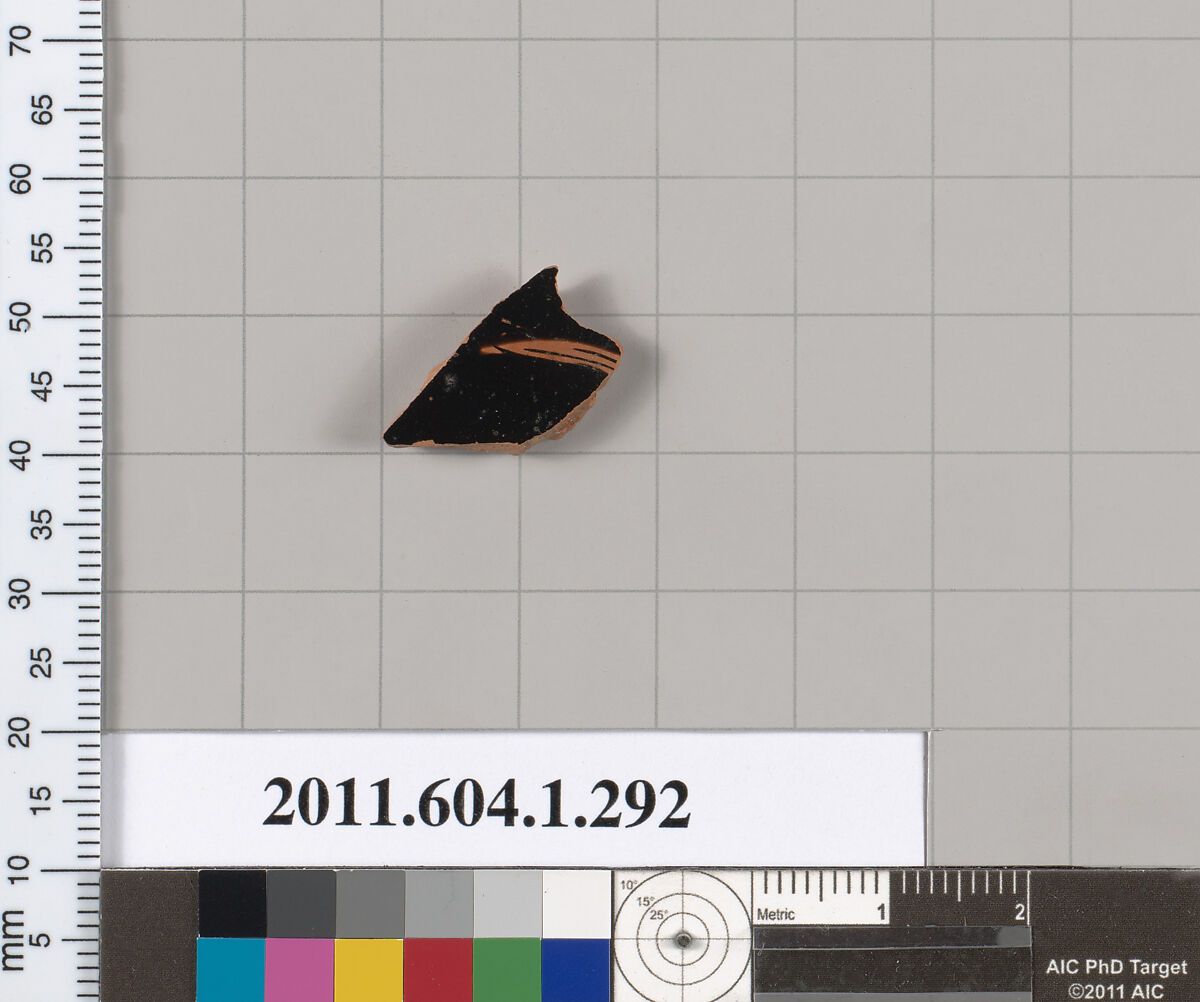 Terracotta fragment of a kylix (drinking cup), Terracotta, Greek, Attic 