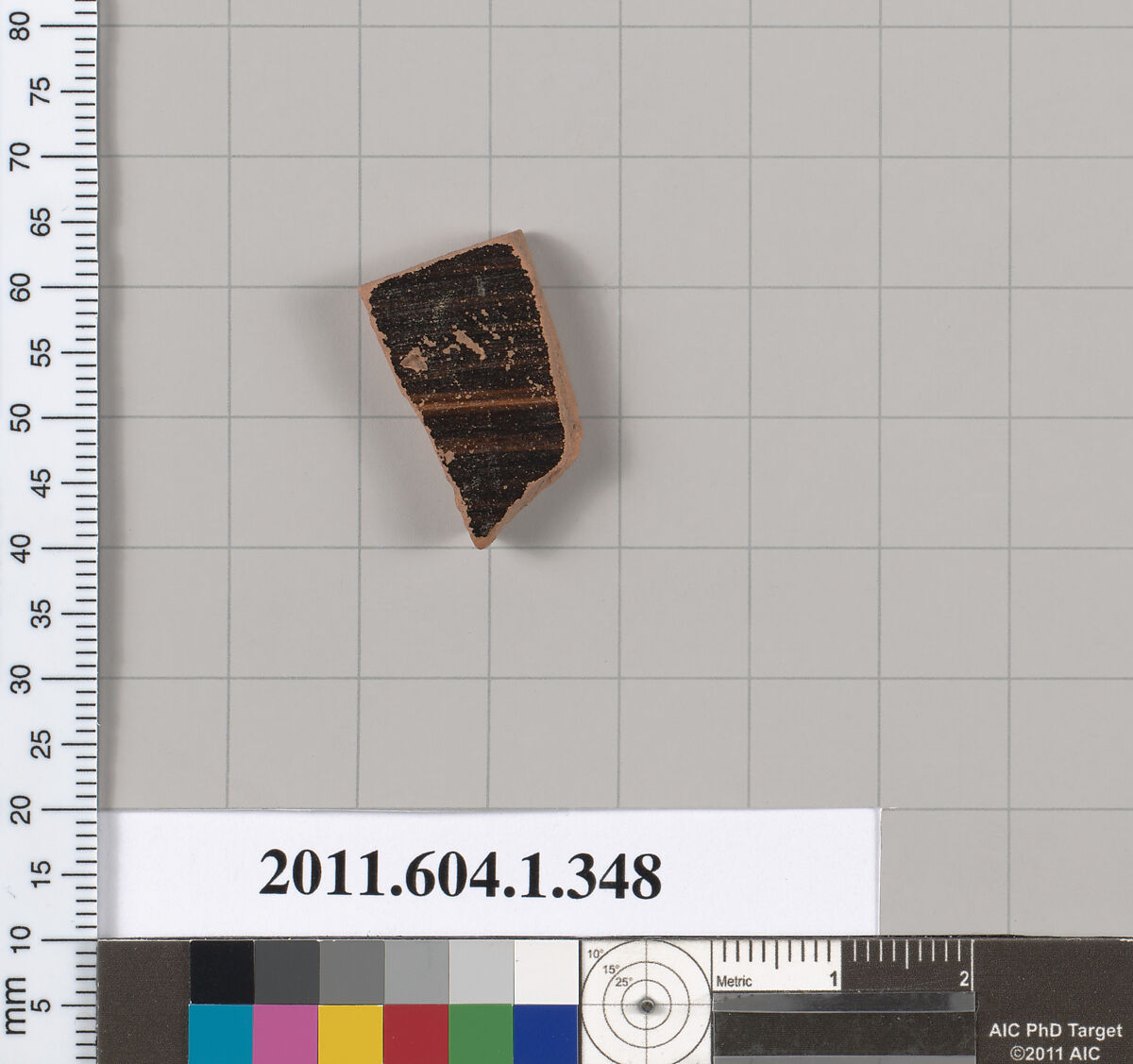 Terracotta fragment of a kylix (drinking cup), Terracotta, Greek, Attic