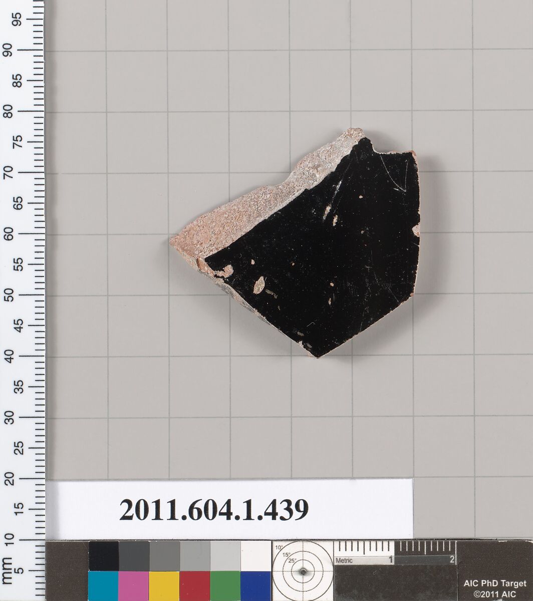 Terracotta fragment of a kylix (drinking cup) or plate, Terracotta, Greek, Attic