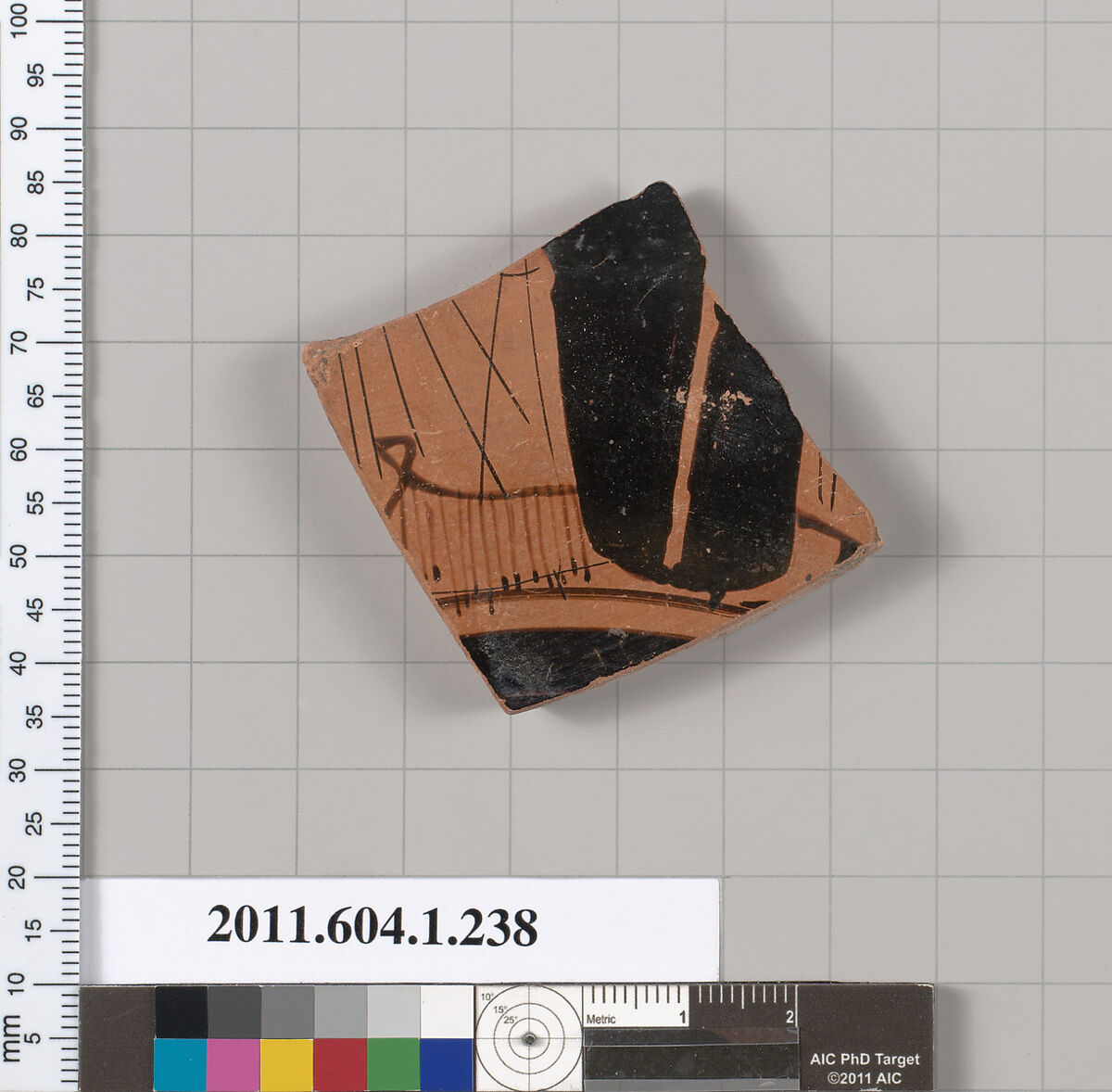 Terracotta fragment of a kylix (drinking cup), Attributed to the Angular Painter [DvB], Terracotta, Greek, Attic