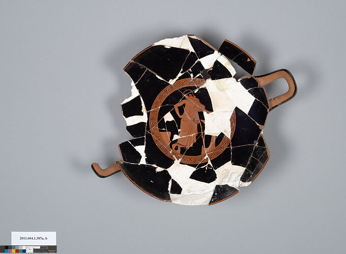 Terracotta fragment of a kylix (drinking cup)