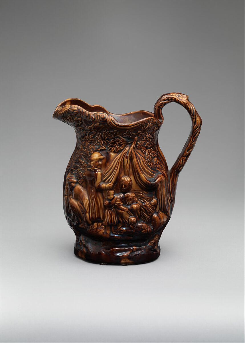 "Gypsy" pitcher, E. &amp; W. Bennett Pottery (American, Baltimore, Maryland 1847–1857), Slip-cast; yellow earthenware, American