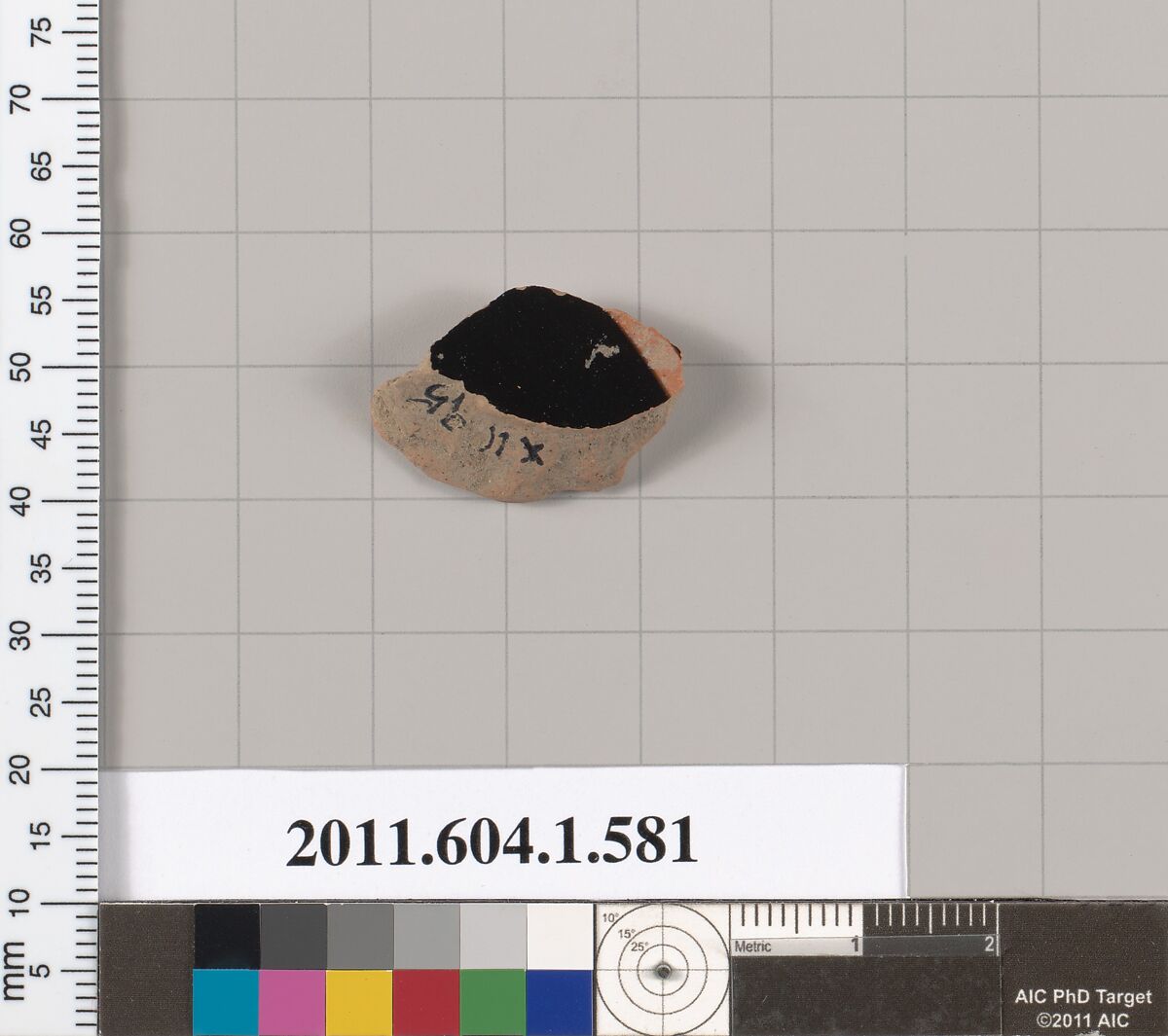 Terracotta fragment of a kylix (drinking cup), Terracotta, Greek, Attic