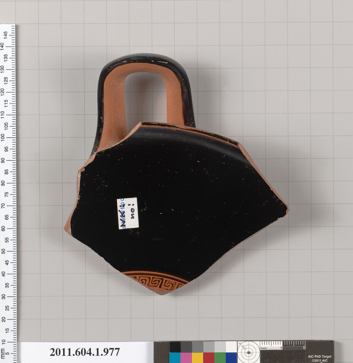 Terracotta fragment of a kylix (drinking cup), Terracotta, Greek, Attic