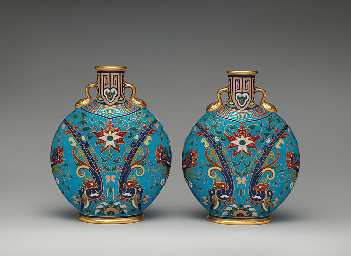 Round, flat bodied bottle (one of a pair)