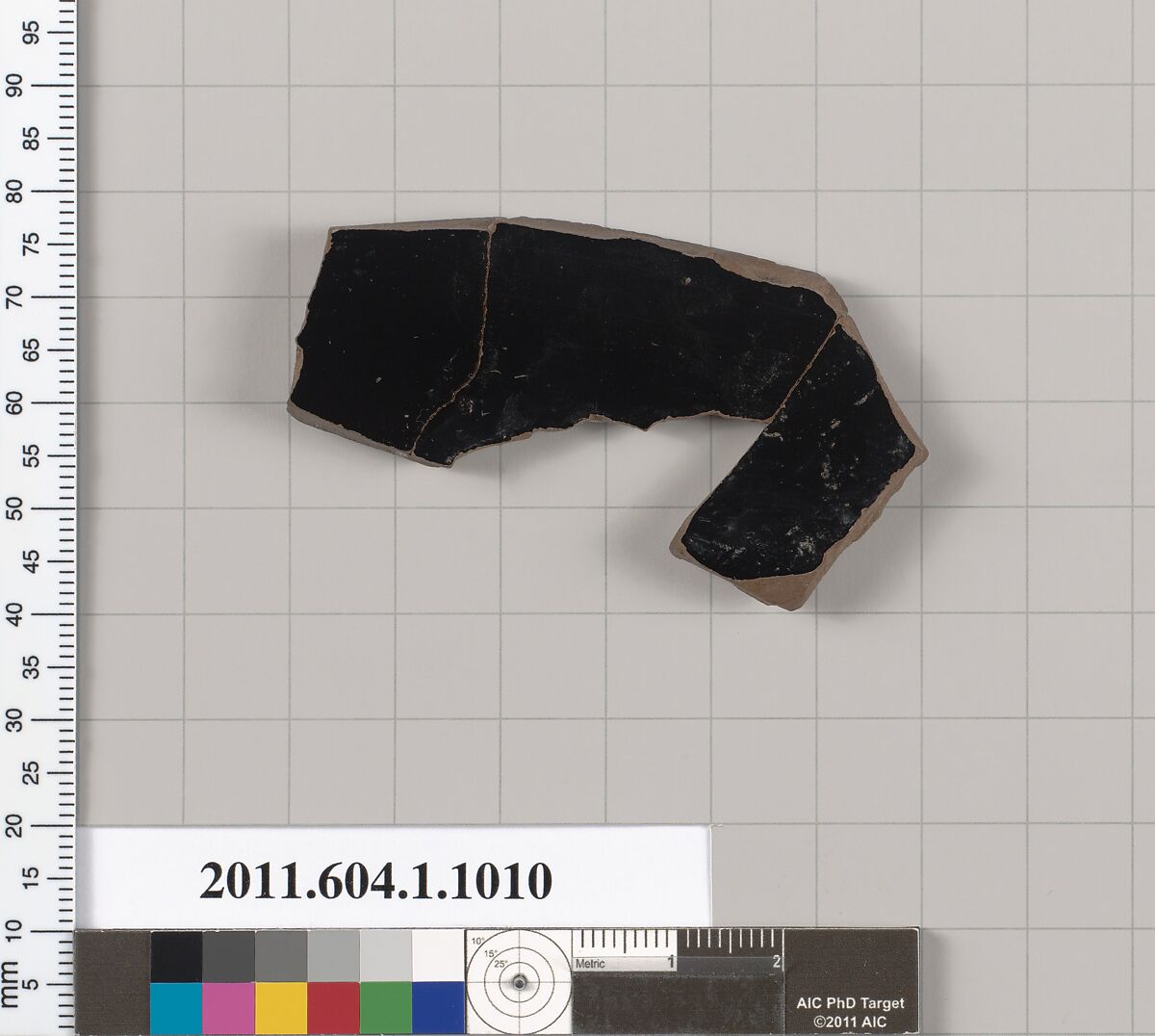 Terracotta fragment of a kylix (drinking cup), Terracotta, Greek, Attic