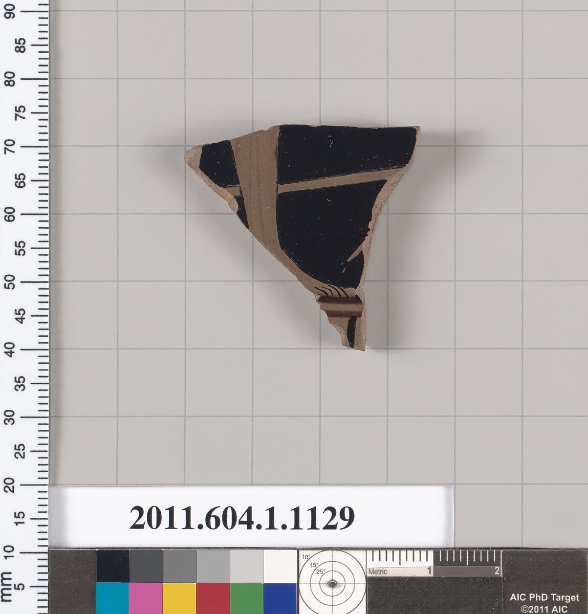 Terracotta fragment of a kylix (drinking cup), Terracotta, Greek, Attic