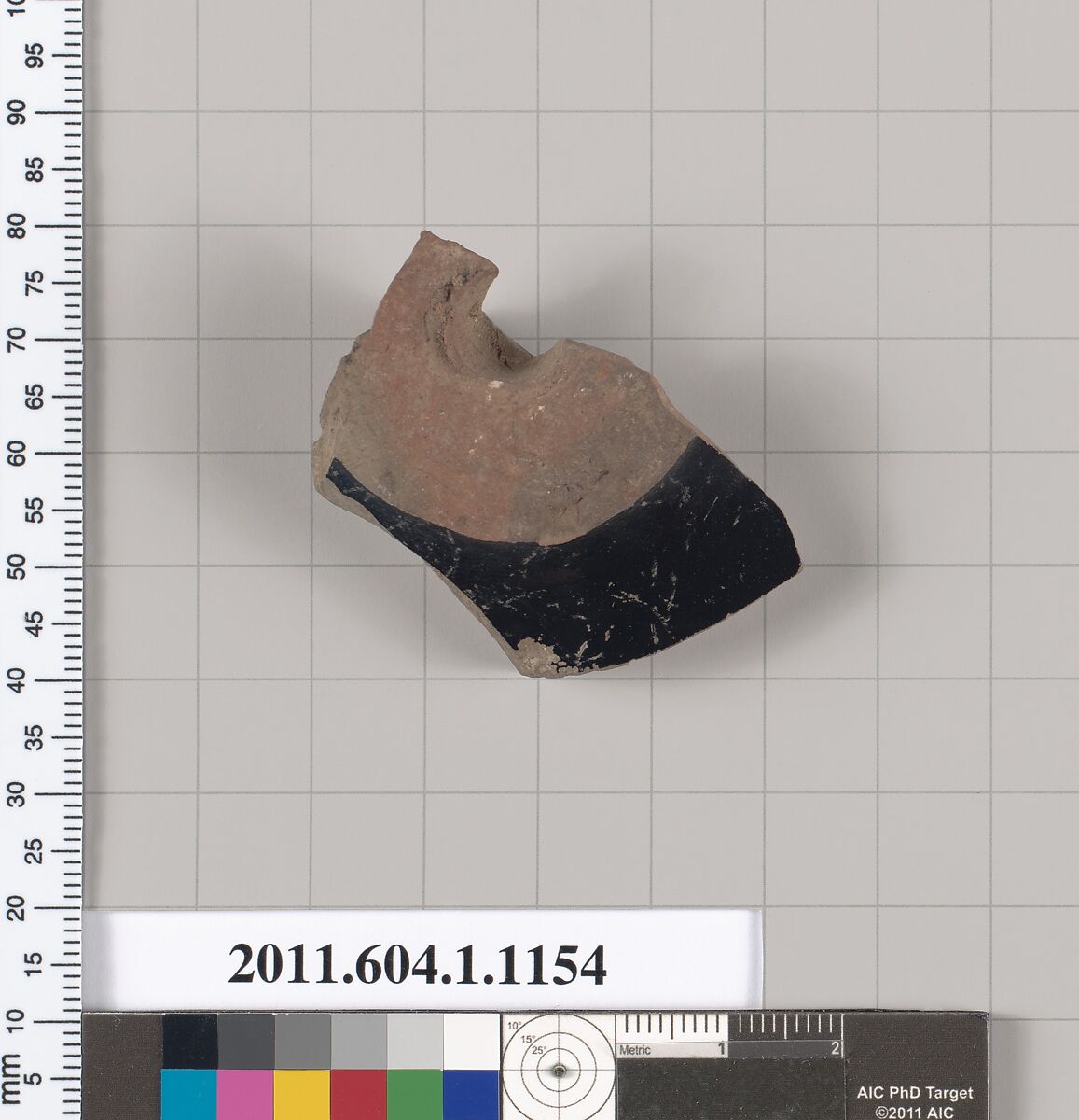 Terracotta fragment of a kylix (drinking cup), Terracotta, Greek, Attic