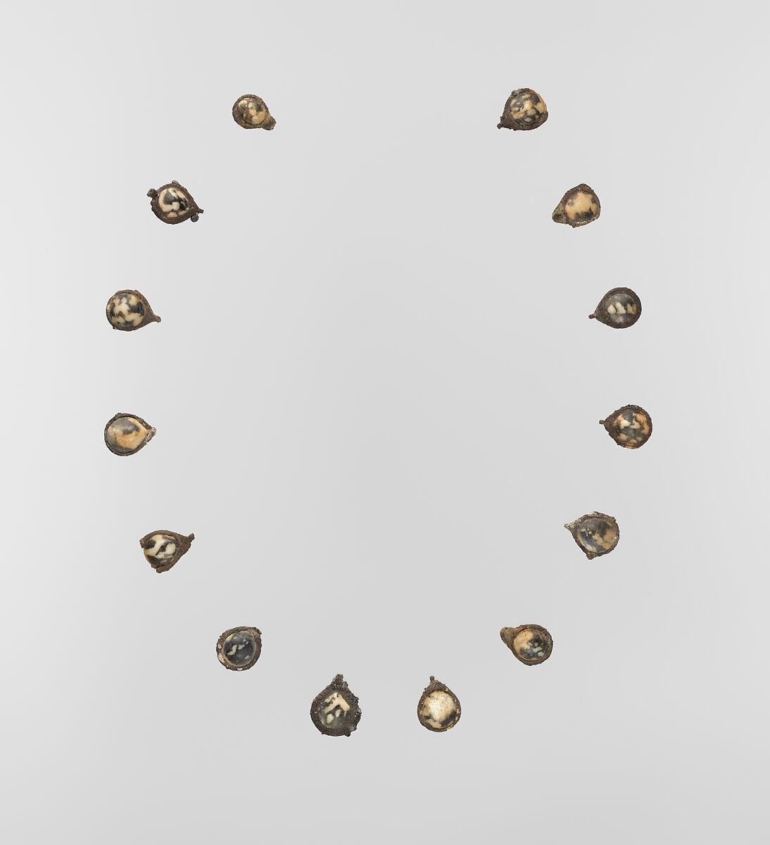 Fourteen pendants for a necklace, Silver and shell