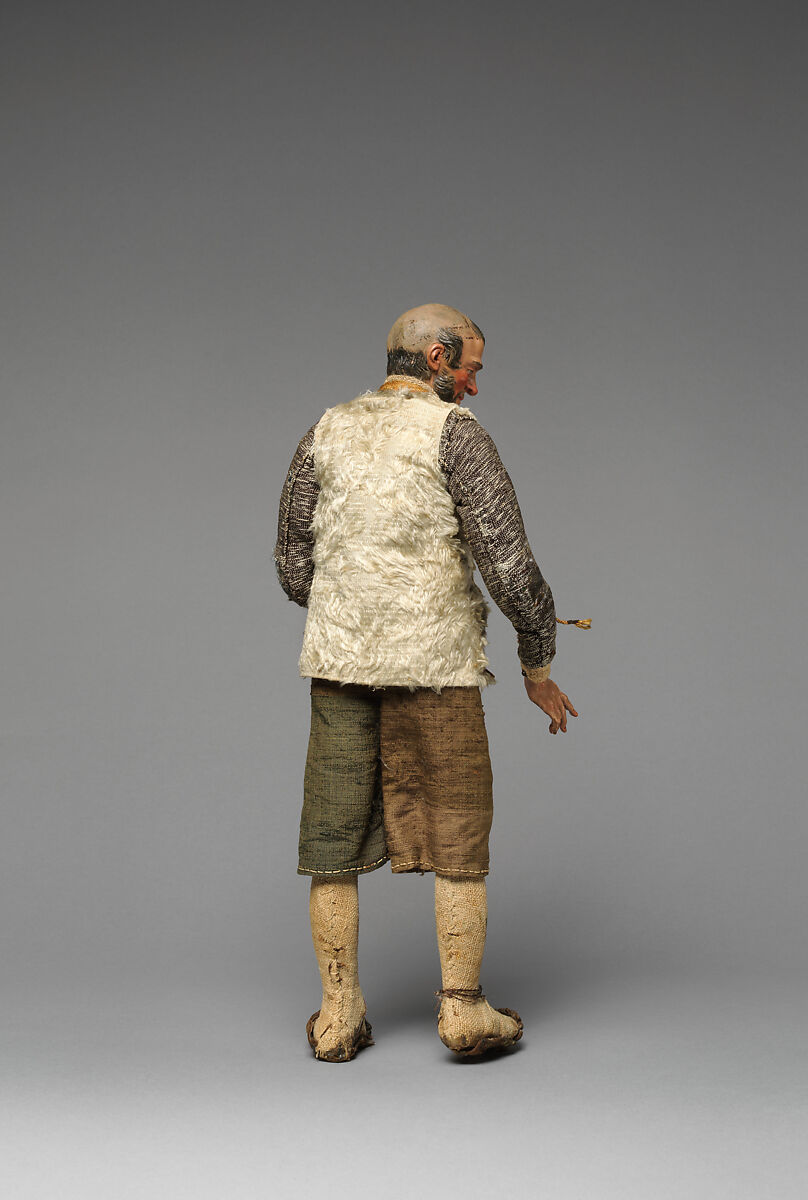 Bearded “Innkeeper” with white furry vest, black/white shirt, brown knickers, Mixed media, Italian