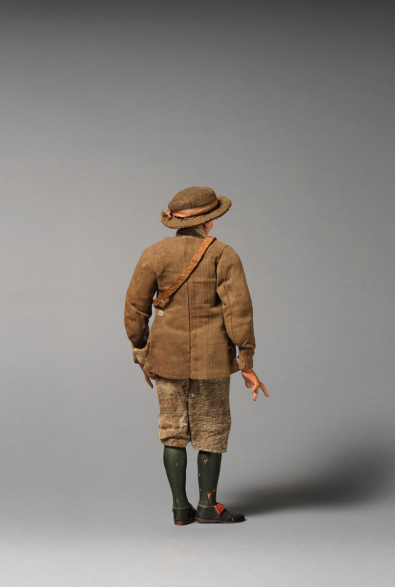 Man in brimmed hat, brown lace-up jacket, green vest, belt buckle, shoulder bag, Mixed media, Italian