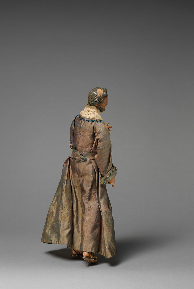 Small “Joseph” with hand raised in purple/grey long robes, Mixed media, Italian