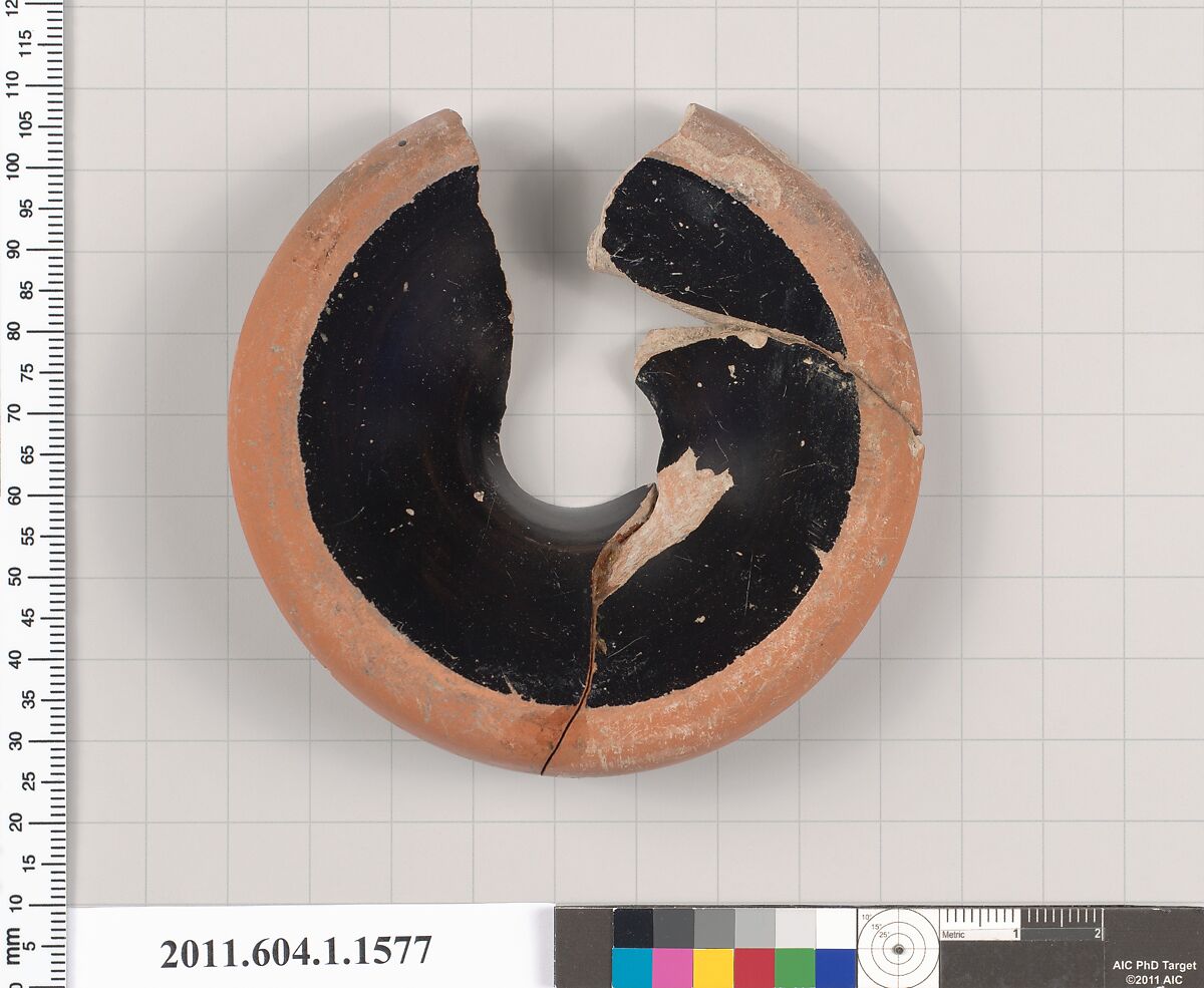 Terracotta fragment of a kylix (drinking cup), Terracotta, Greek, Attic