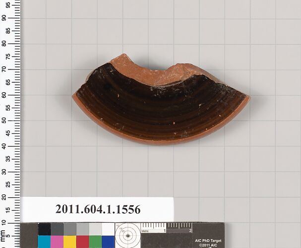 Terracotta fragment of a kylix (drinking cup)
