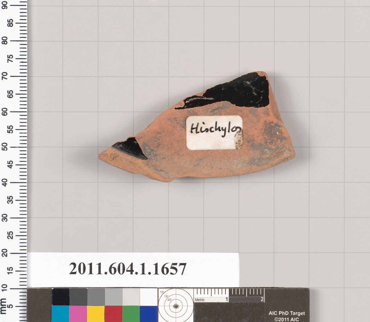 Terracotta fragment of a kylix (drinking cup), Hischylos Painter, Terracotta, Greek, Attic