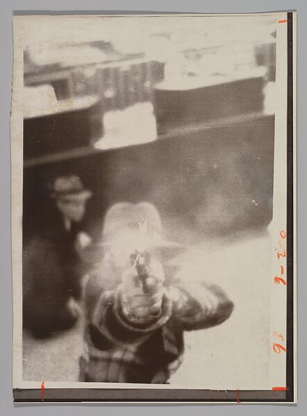 [Bank Robber Aiming at Security Camera, Cleveland, Ohio], United Press International (American), Gelatin silver print 