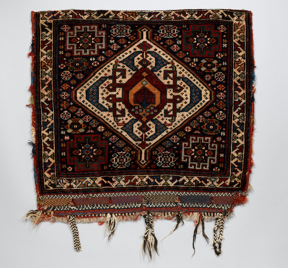 Half of Double Saddle Bag (Khorjin), Wool (pile, warp, and weft); asymmetrically knotted pile, tapestry weave, brocaded with wool and cotton 