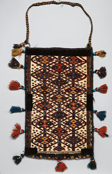 Spindle Bag, Wool (warp, sumak weft, pile, and tassels), cotton (ground weft and tassels), goat(?) hair (side finishes and tassels), metal rings, braided strap, and faience beads (tassels); weft-faced plain weave with pattern in sumak extra-weft wrapping (front and back); symmetrically knotted pile (bottom edge)