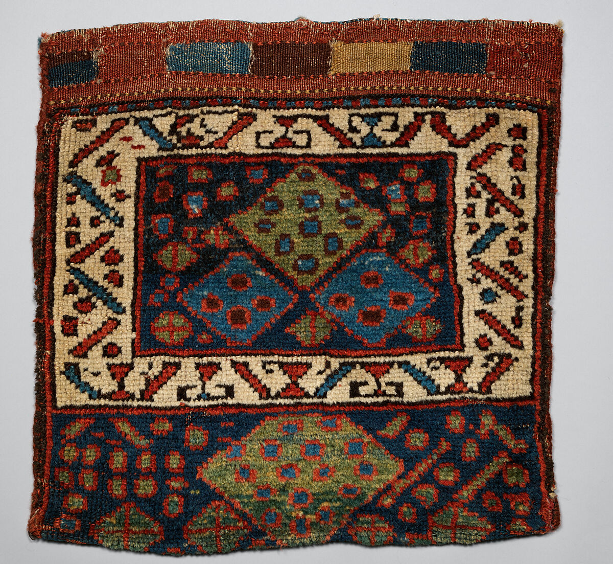 Face from Half of Double Saddle Bag (Khorjin), Wool (warp, weft, and pile); symmetrically knotted pile, tapestry weave 