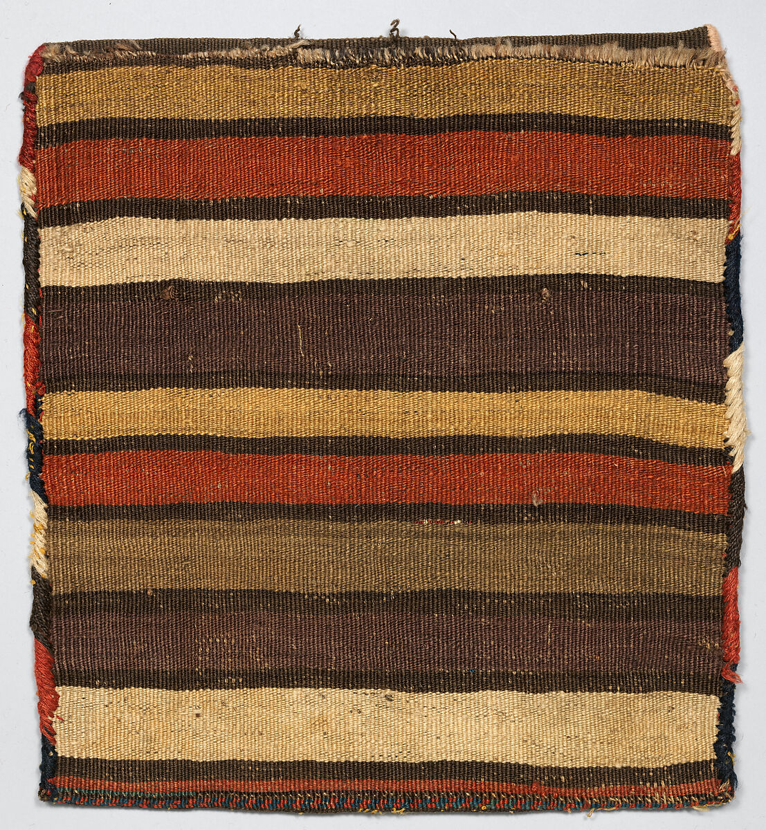 Face of Half a Double Saddle Bag (Khorjin), Wool (warp, ground weft, and supplementary weft) and goat(?) hair (sumak weft); knotted extra-weft wrapping and weft-faced plain weave (front); weft-faced plain weave (back)